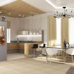 Cucina adiacente con soggiorno illuminato diversamente