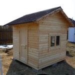 Casa de madera para niños, forrada con tablilla