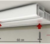 Fase di installazione degli elementi di fissaggio per il cornicione del soffitto